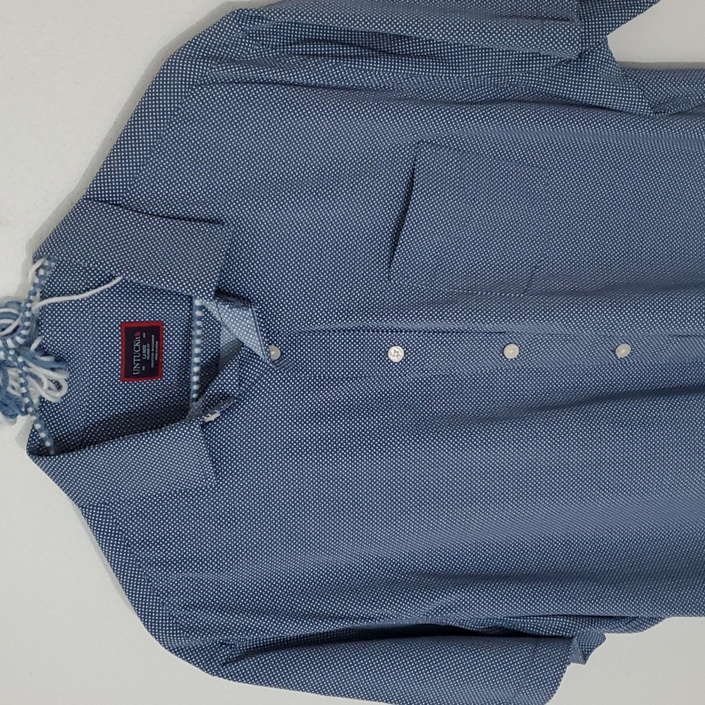 Untuckit full button short sleeve shirt.